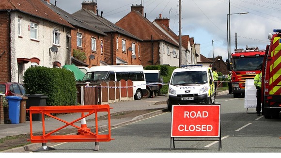 Victory Road in Derby is closed after five children die in a fire