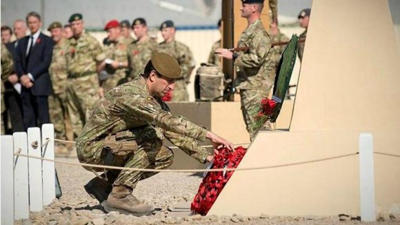 Soldiers of 7th Armoured Brigade The Desert Rats in Helmand province of Afghanistan pay their respects.