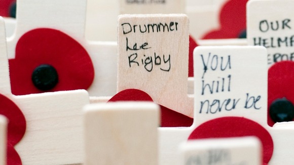 A cross to remember Drummer Lee Rigby in the Field of Remembrance outside Westminster Abbey.