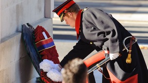 Prince Harry lays a wreath at the Cenotaph memorial in Whitehall.
