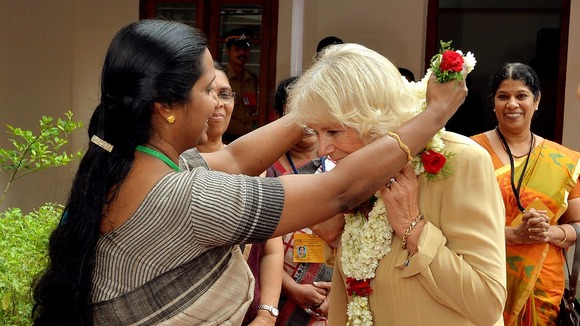 Camilla receiving floral wreath