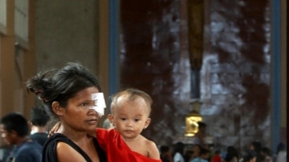 A woman and child in the Church