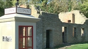 The telephone box still stands in Tyneham, most of the building are in ruins