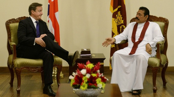 Prime Minister and David Cameron and Sri Lanka's President Mahinda Rajapaksa