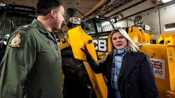 International Development Secretary Justine Greening with RAF Brize Norton Station Commander, Group Captain Steve Lushington.