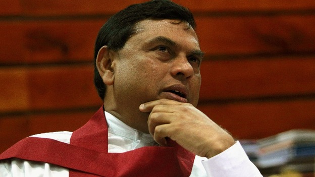 Sri Lanka's Minister of Economic Development Basil Rajapaksa, has rejected David Cameron's calls for an international war crimes probe.