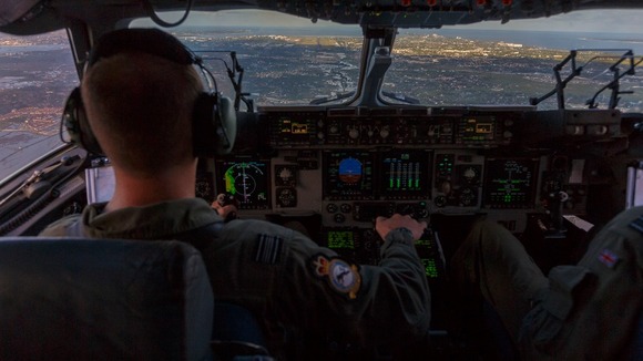 A pilot during the approach of the C-17 transporter plane carrying aid into Cebu airport in the Philippines.