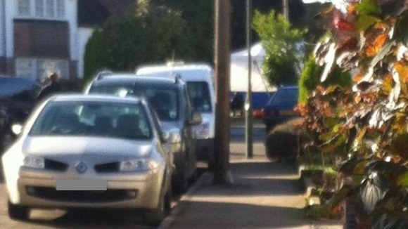 A forensics tent is put up over the well in Audley Drive.