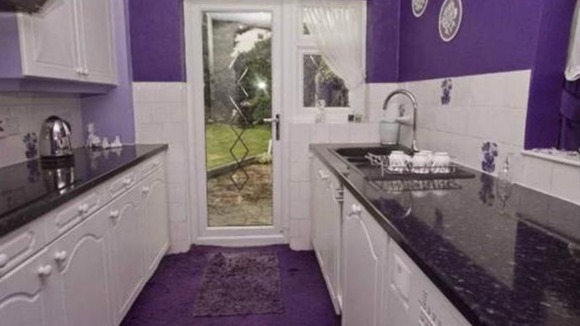 The kitchen carries on the colour scheme despite being a smaller room.