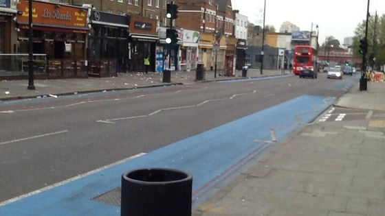 One side of Clapham High Street was cleaned, the other side was left dirty.