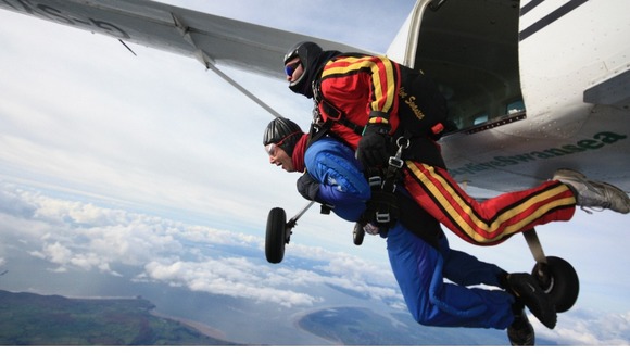 Nikolas Royale jumping out of a plane