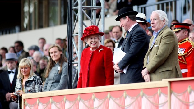 Queen Elizabeth II (centre) during the Royal Windsor Horse Show at Windsor Castle, Berkshire
