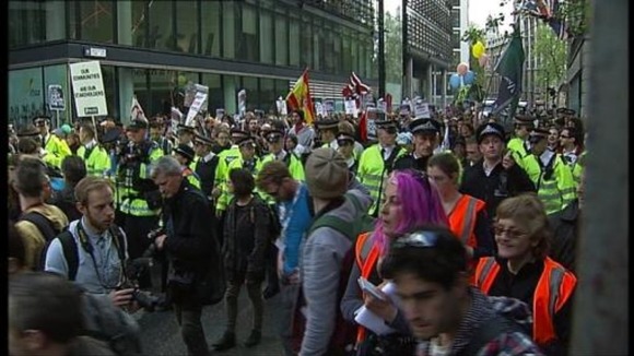 Occupy London supporters march through the City