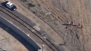The satellite image showing police officers and a patrol car. Kevin Berrera has been cropped out of this image.