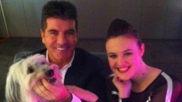 BGT judge Simon Cowell posted this picture on Twitter with competition winners Ashleigh and dog Pudsey.