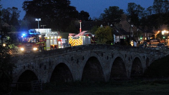 Emergency services seaching the River Avon after a boat capsized