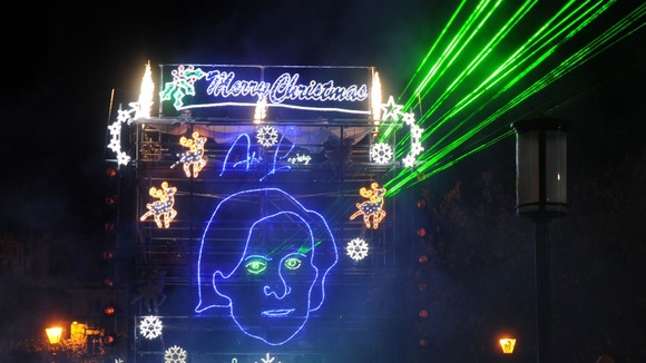 The light sculpture fires powerful images from his eyes to project giant images of the character on to walls of nearby buildings.