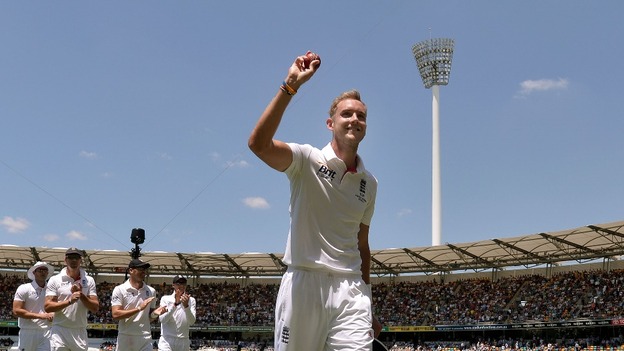 Stuart Broad holds the match ball as England leave the filed after he took six wickets during day two of the first Ashes Test.