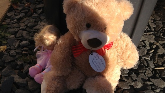 Teddy Bears have been left outside the home of a toddler who died yesterday.