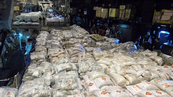 Headed for the Philippines: 500 tonnes of tarpaulins, water tanks, rice and biscuits.