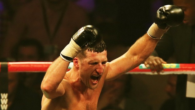 Carl Froch celebrates following a ninth round stoppage in his WBA and IBF Super Middleweight Title fight against George Groves.