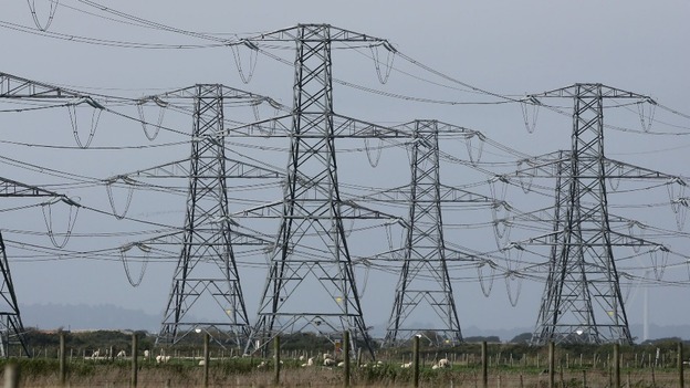 General view of electricity pylons near Lydd, Kent.
