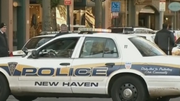 New Haven Police have blockaded a street to the side of Yale University's Old Campus.