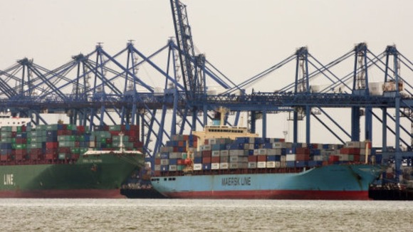 A report by MPs says the port of Felixstowe is one of several around the country being hindered by road and rail bottlenecks.