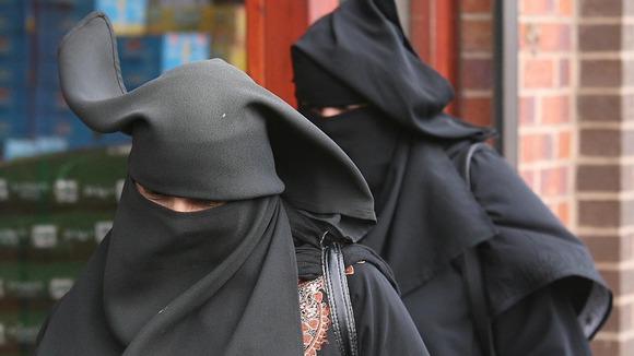 Two women in Blackburn both wearing a niqab