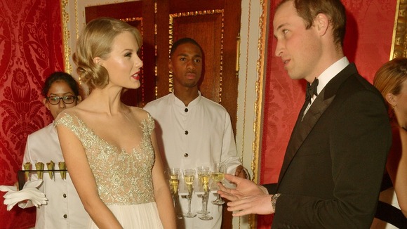 Taylor Swift and Prince William chat before their performance.