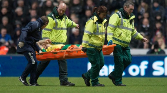Anthony Pilkington is carried off the pitch at Newcastle.