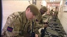 Grenadiers checking weapons