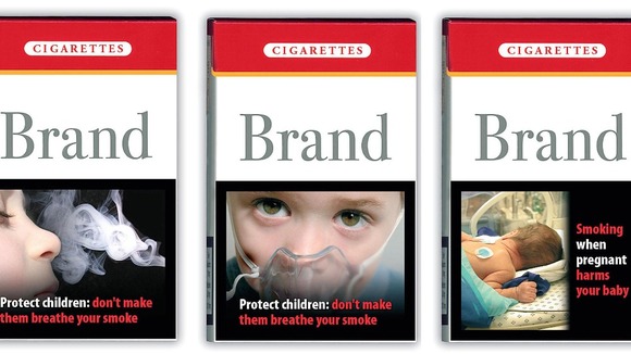 Hard hitting picture warnings for cigarette packs introcuded in the UK in 2004.