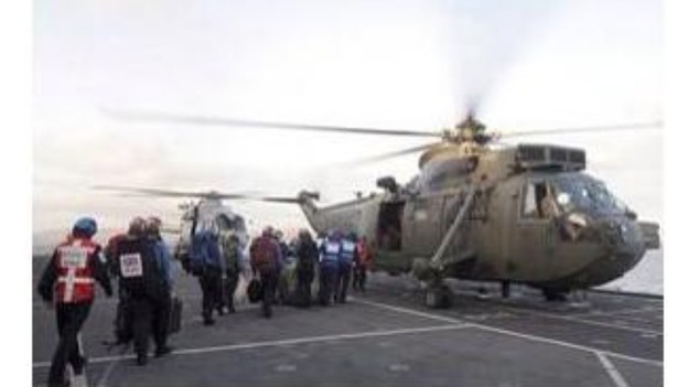 Justine Greening posted this image of a helicopter from HMS illustrious delivering aid to cut off islands.