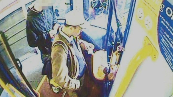 Anxiang Du boards a bus on the day of the killings.