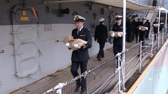 The bags were delivered by the Belgian Navy frigate Louise-Marie, which berthed alongside HMS Belfast