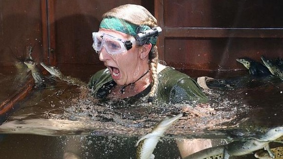 Rebecca meets baby crocodiles in the Bush Tucker Trial.