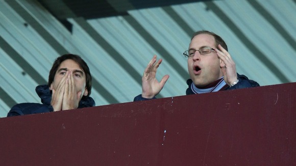 Prince William reacts to the action on-pitch