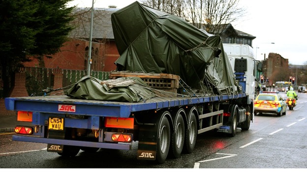The wreckage of the police three-tonne Eurocopter is taken away