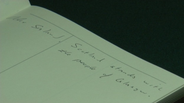The message written by Scotland's First Minister Alex Salmond in a book of condolence for the Glasgow helicopter crash victims.