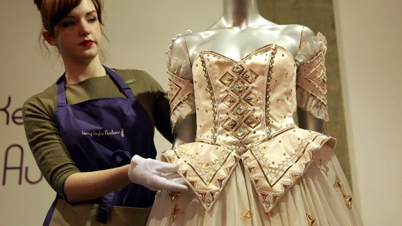 Diana's dress fetched £102,000 at auction, including buyer's premium