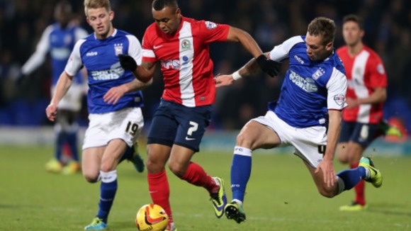 Luke Chambers challenges Blackburn's Joshua King in last night's victory.