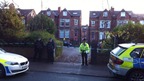 Police cordon outside property where police officer was shot