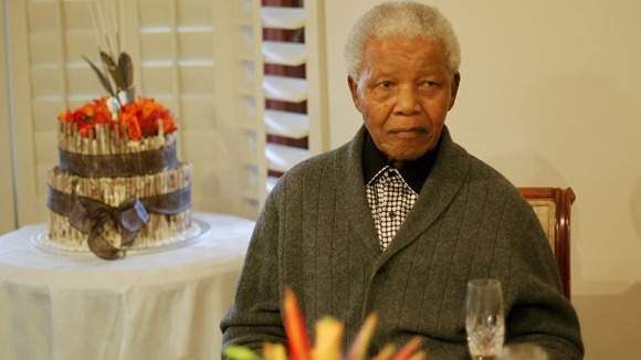 Nelson Mandela looks on as he celebrates his 94th birthday at his house in Qunu, Eastern Cape July 18, 2012.