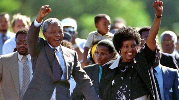 After almost 27 years in jail, Nelson Mandela walks free from Victor Verster prison near Cape Town on 11 February 1990.