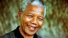 The world mourns Mandela's death and celebrates his life