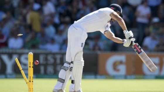 Alastair Cook is bowled by Mitchell Johnson.