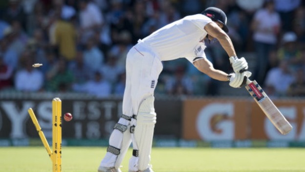 Alastair Cook is bowled by Mitchell Johnson.