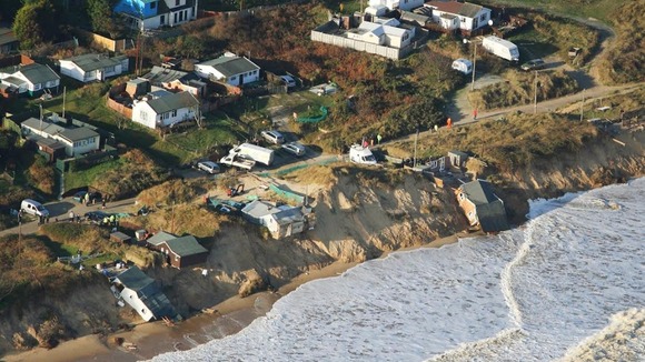 Several homes by the sea in Hemsby were destroyed by large waves.