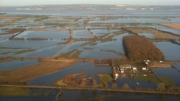 Flooding over north Lincolnshire, as air crews check for overhead power line network damage.